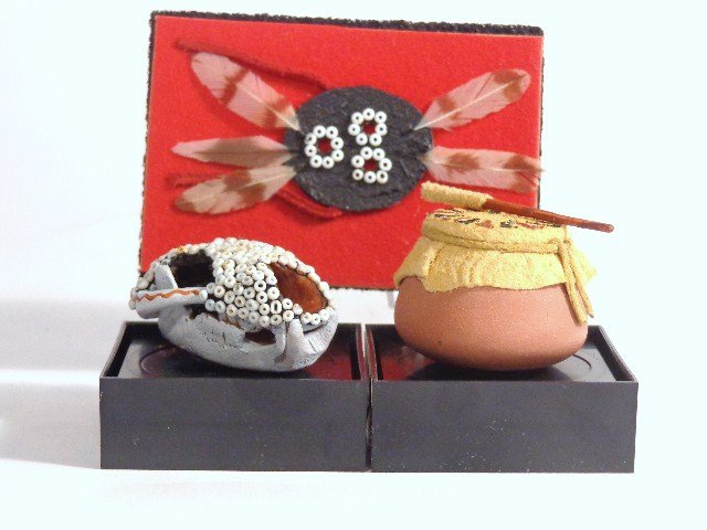 Rainbow Hand Drum and Skull: An Apache Clay drum with rawhide skin 7/8" H, a Chumash devil mask and a Chumash bear skull decorated with beads.