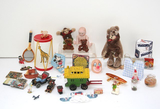 Nursery Toys: Great assortment of miniature toys including a large bear with a chimpanzee clutching his neck 2.75" H, a tiny ceramic Jemima Puddleduck by Mary Grady O'Brien, Mickey Mouse kite, faux books , a pegboa