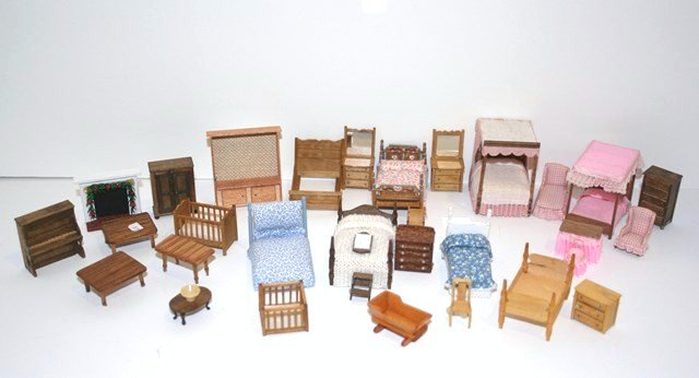 Quarter-scale Furniture: Large assortment of quarter-inch scale furniture comprising multiple beds in different styles, cribs, tables, dressers, etc. Canopy bed just under 2" H. Most pieces signed by Susan Hoeltge.