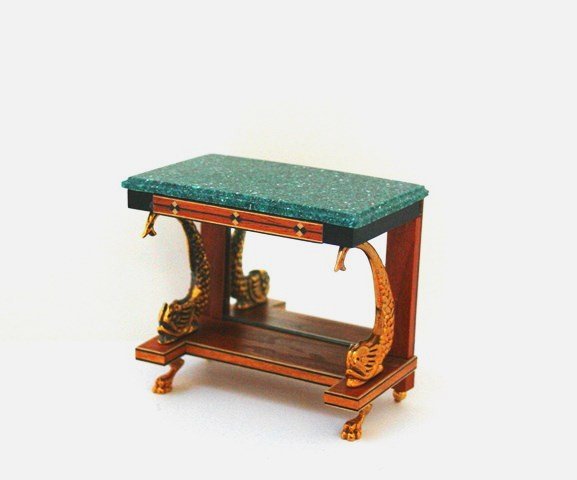 Tony Jones Dolphin-base Console: A mirrored console table with gilt dolphin-style supports and lion's paw feet , with delicately inlaid apron and banded inlay accents, topped with contoured green granite top. 3" H, 3.5" W. Signed by 