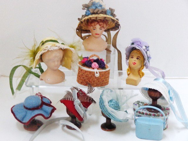 Mixed Lot of Hats: Decorated straw hats and bonnets by MJ Designs and others, hats stands, mannequins and purses including a straw sewing basket with ribbon roses 3/4" H, 1.25" W.