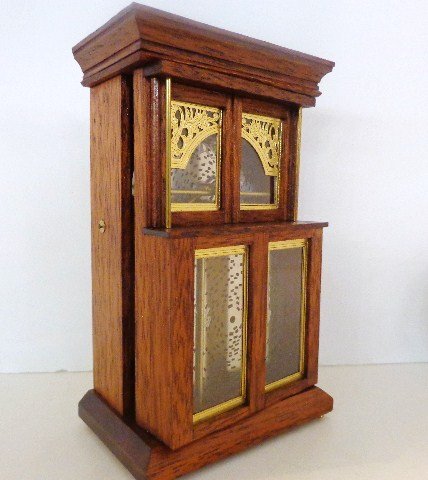 Standing Changing Music Box Rare: An incredible miniature replica of the famous Regina Standing Changer Music Box although the disc says Komet musical disc player from the Victorian Era with two additional discs. Handcrafted mahogany 