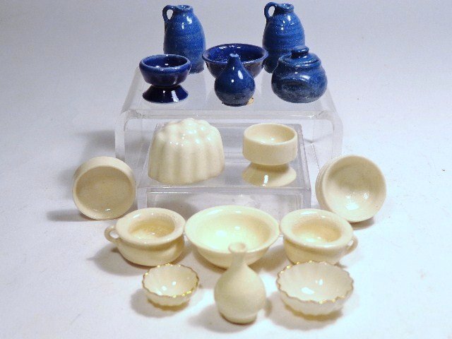 Artisan Pottery: Assorted blue and white pottery by Carolyn Curran and others including a very delicate pair of nested bowls with gilt rims, the larger 3/4" diameter. Over a dozen pieces.