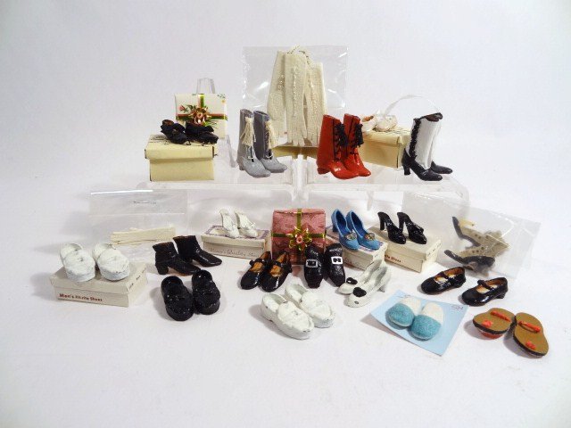 Miniature Shoes and Boots: Assorted pairs of shoes, some in boxes, some by the Dolls' Cobbler, some unsigned. Red boots 1" H. Also a nice assortment of gloves and hankies in gift boxes.