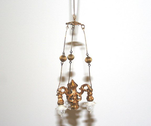 Antique Ormolu Chandelier: Three-arm ormolu chandelier with original glass shades and globes, one set of links missing, some restoration to the top section, good patina. 5" L