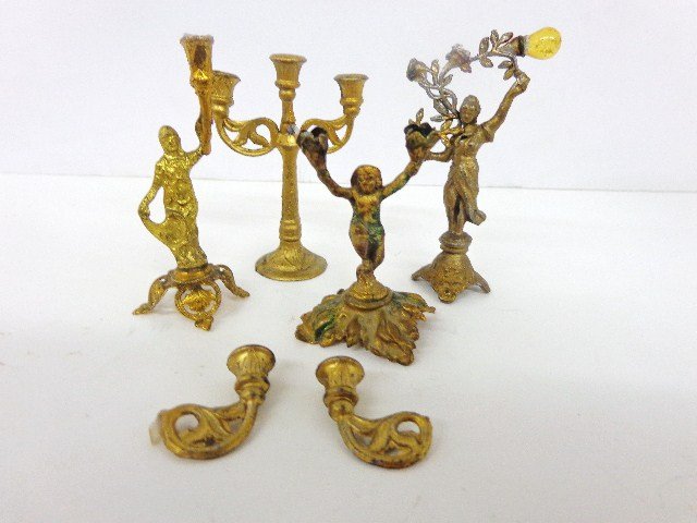 Antique Candelabras: Two antique ormolu candelabras with uplifted arms, the taller 2.75" H and two gilt metal examples: one with yellow globe, the other has two broken arms that can be re-attached. Interesting forms. DISP