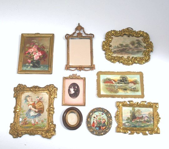 Ormolu Pictures: Three antique prints in ormolu frames (one picture punctured), vintage German floral print in brass frame 2.25" X 3", and assorted small pictures and mirrors.