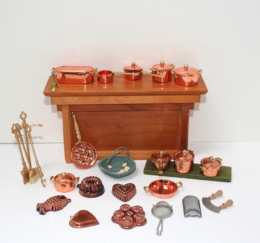 Copper Kitchenware: Large assortment of commercially produced copper pots and pans (mostly Bodo Hennig), assorted utensils and fireplace tools. Copper mold 1" H. Wood display cabinet NOT INCLUDED