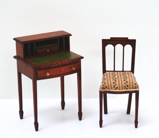 Dennis Jenvey Desk and Chair: Delicate Sheraton mahogany lady's writing desk with inset leather writing surface 3.25" H with matching upholstered chair. Nicely made.