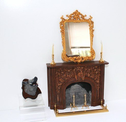 Hodgson Mirror and Fireplace Group: A handsome gilt mirror 4.5" H, 3" W by John Hodgson dated 1991 with an unsigned but finely detailed resin and wood fireplace 4" H, 5" W (probably by Lawbre), a mounted boar's head by Lawbre, brass and