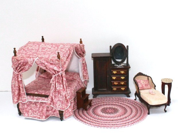 Toile Bedroom Suite: A canopy bed upholstered in a small scale toile pattern by Peggy Smeriglio 7.25" H, 7" L, with a pretty pink braided rug by Jody C. 8" diameter, commercial dresser, chaise, bed steps, knitting and pla