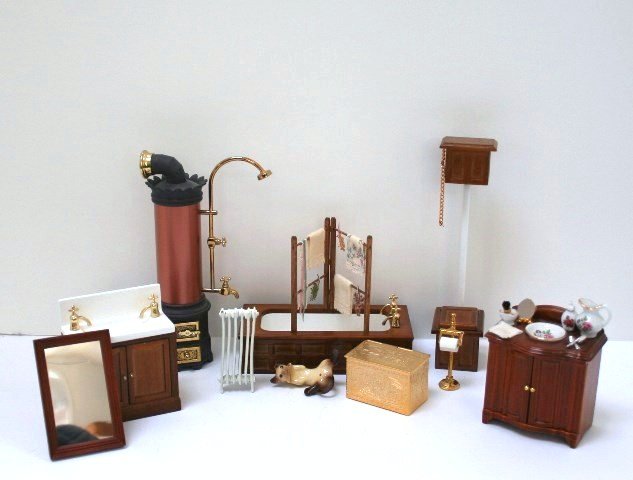 Victorian Bathroom: A commercial bathroom suite with tub 5.25" L, a Bodo Hennig metal water boiler with shower head, a Reutter shaving stand with items glued in place and a cute folding towel stand.