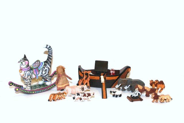 Artisan Nursery Items: Delightful Amanda Skinner rocking cat dated 2004 2.5" H and 3" L, a Carol Spence Sellner cloth doll (wax on backside) and a remarkable Noah's ark with animals. Quality items for the nursery.