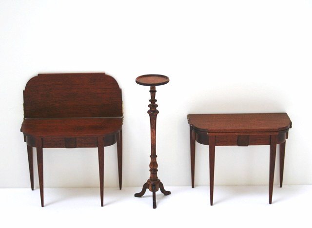 Roger Gutheil Console Tables: A pair of mahogany hinged-top Hepplewhite console tables, both dated 2006, 2.5" H, 3" W, with a Gutheil tall plant stand 4" H.