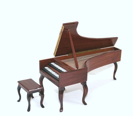 Carl Isabelle Harpsichord: A walnut Queen Anne double-keyboard harpsichord with stool by Carl Isabelle. Just over 3" H, 7" L.