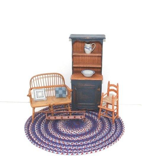 Artisan Country Furniture: A Windsor settee by Nicole Walton Marble 3.24" H, 3.75" W dated 1996, a blue painted cupboard by CJ's 1995, a high chair by Don Perkins, pegboard by Pam Boorum, two petitpoint pillows, pitcher and bow