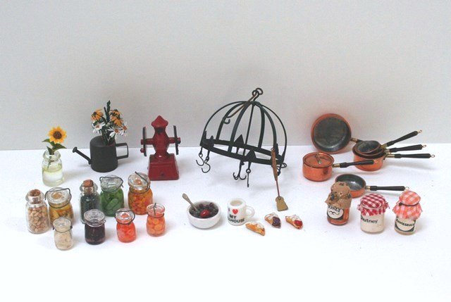 Canning Season: Nice assortment of filled canning jars, a handsome forged iron pot rack, set of J. Getzan copper cooking pans, coffee grinder, and a cute watering can filled with daisies 1.5" H.