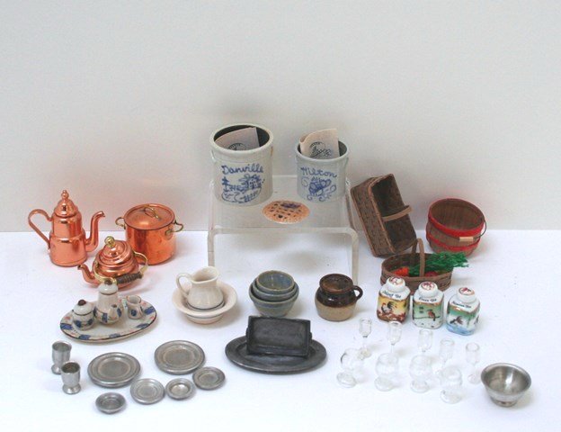 Crocks and Baskets: Two hand-made crocks from Vernon Pottery, nice ceramic pitcher and bowl, set of three mixing bowls both by Jerri Floor, Jane Graber bean pot, some commercial copper pots and pans and splint baskets by