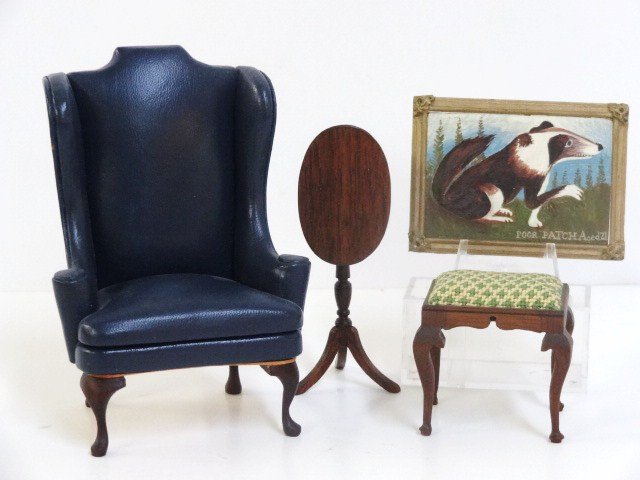 Crawford and Hoffman Furniture: A small mahogany tilt-top table by Gerald Crawford 3.5" H when raised, a footstool by George Hoffman with petitpoint upholstery, a leather upholstered wing chair signed RSJ, small wall bracket signed