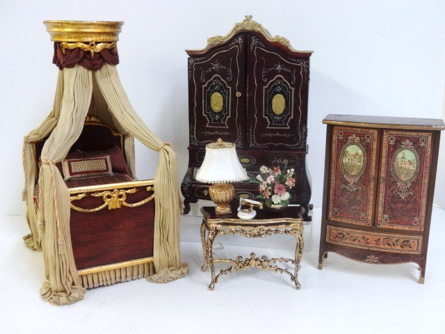 June Clinkscales Canopy Bed: Magnificent gilt and mahogany Directoire canopy bed with beautifully pleated draperies suspended from an elegant coronet. Just gorgeous. 9" H, 6" L, 4.5" W. With a decorated Bespaq baby house cabinet 