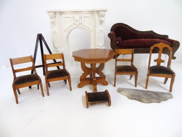 Antique Schneegass Furniture: Four antique German upholstered chairs with matching footstool, an upholstered recamier 6.25" L (one back leg replaced), an octagonal parlor table plus a modern cast plaster Victorian fireplace and an