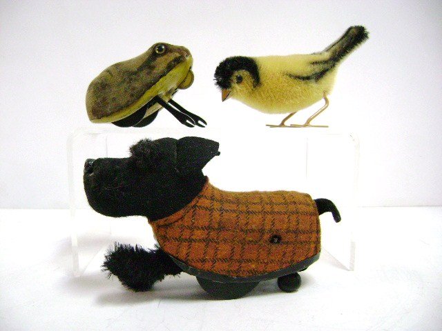 Three Schuco Animal Wind-ups: Schuco Scottie dog, frog and yellow bird