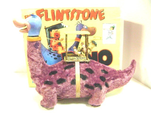 Marx Fred Flintstone and Dino with O.B.: Marx Toys, plush covered Dino battery operated, walks along with Fred in tin litho canopy on back, 18" L, purple plush body with blue head