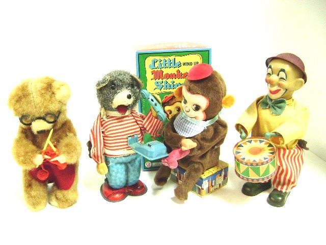 Four Wind-Up Toys: Alps Telephone Bear answers ringing phone, clown beats drum, bear knits, newer monkey shoe shine in O.B., tallest 7"