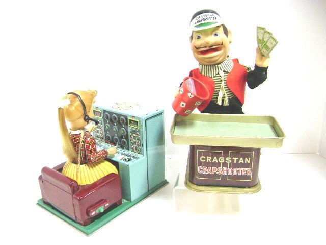 Marx Switchboard and Crapshooter B.O.: Marx litho tin telephone switchboard 8" H and Cragstan Crapshooter 9.5" H