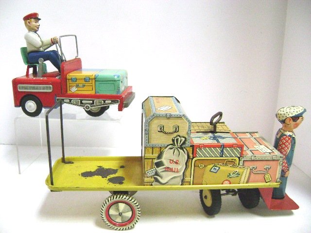 Unique Art Baggage Cart and B.O. Cart: Unique Art tin litho wind-up baggage cart 13.5" L with paint loss on rear shelf, TM Japan tin litho baggage cart 7.5" Long B.O.