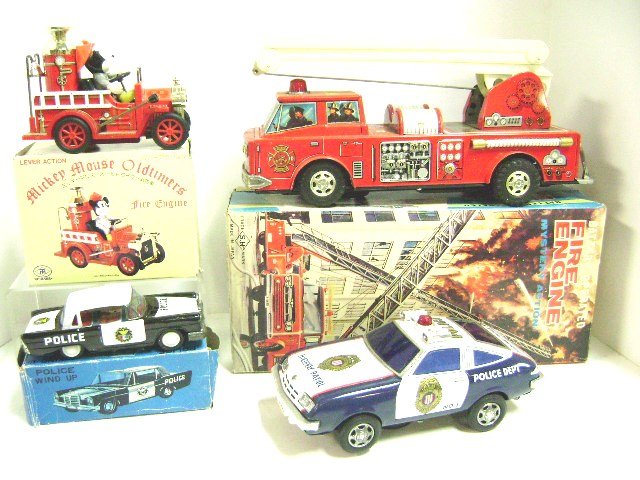 Group of Fire and Police Vehicles: S.H. Japan B.O. fire engine in O.B., wind-up police car in O.B.,, MT Japan Mickey Mouse Old Timers Fire Engine O.B.