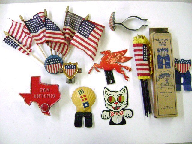 Group of License Plate Toppers and Badges: Mobil Oil Pegasus, Shell, Texas Texell San Antonio badge from 1940's, 48 star set in original box and bumper 48 star flag set