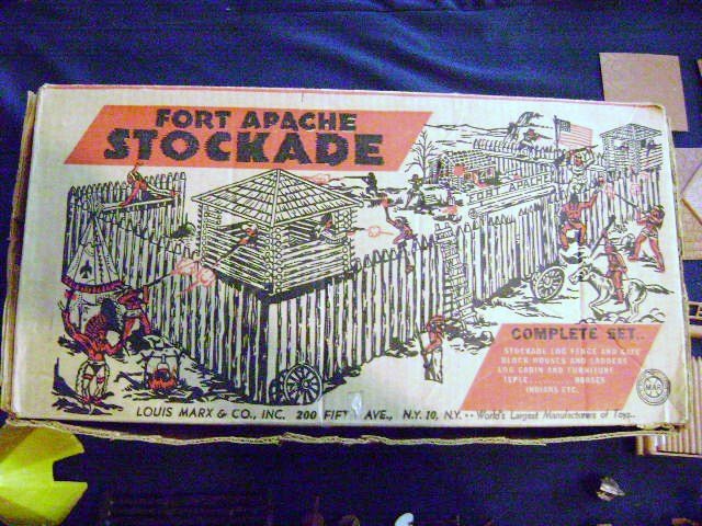 Marx Fort Apache Stockade and Misc. Pieces: Marx Fort Apache box with incomplete set, two tin pioneer cabins, misc. plastic army men, cowboys, Indians, animals and accessories