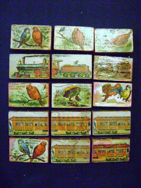 Set of Early Wooden Blocks: Group of fifteen early wooden children's blocks, 19th century with colorful litho paper coverings, some blocks depict an early train with passenger cars on reverse