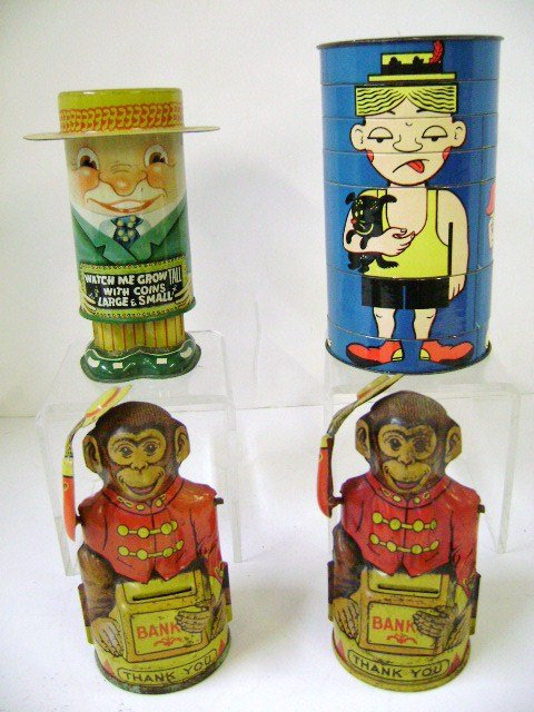 Group Tin Banks and Other: Pair of Chein tin litho monkey banks 5" H, Apex Novelty Company tin litho bank expands from 6" to 9" H, and 1940's Funcraft Comic Rotor toy 6.5" H