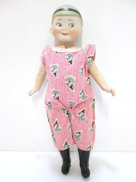 Goole Eye Bisque Doll: Great Bisque Head 9" doll with Prussian Helment, compostion body , painted boots.