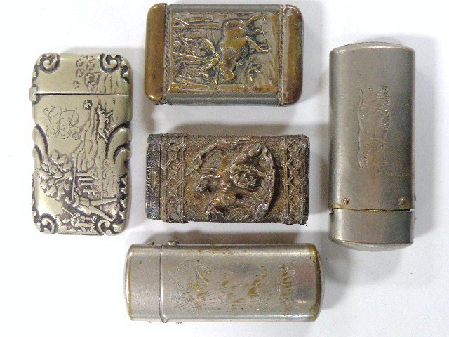 Five Vesta Cases Hunting and Fishing: Two hunters & pointer w/covey marked G. Silver, cast case w/3 raised hunting dogs, plated case w/hunter in woods, moose on reverse 2.25 in. (h), plain case w/engraved pointer 2.9 in. (h), plated case 