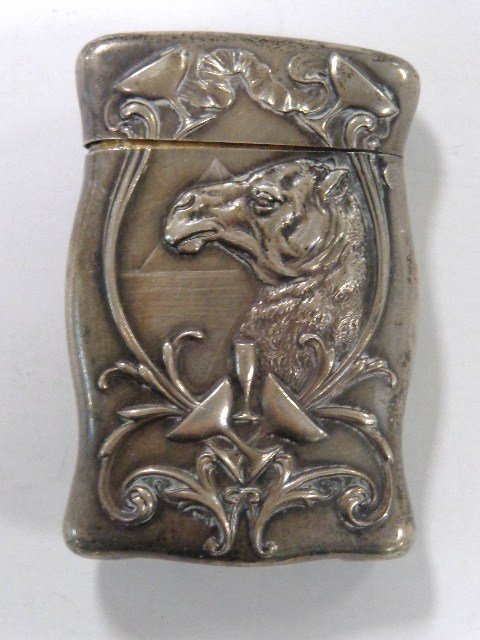 Sterling Camel and Pyramids Vesta Case: Unusual sterling art noveau vesta case featuring a camel w/pyramid in background & wine glasses, marked sterling FB w/arrow 2257, 2.5 in. (h)