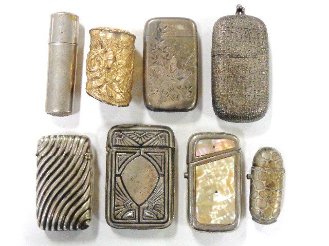 Seven Vesta Cases and Cane Head: Seven vesta cases, various styles and sizes, longest 3.25 in. plus gold filled cane head