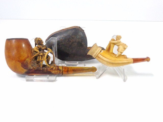 Pair Young Girl Meerschaum Pipes: 2 small Meerschaum pipes featuring figural young girls, girl holding mandolin w/case 3 in. (l) w/chip between bowl & body & a young girl playing w/a hoop 5 in. (l)
