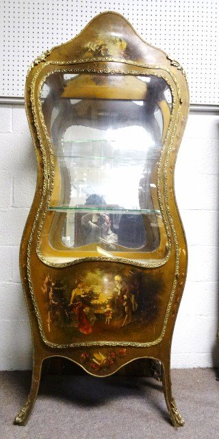 French Painted Vitrine: Unusual French painted vitrine, bow front w/bulbous lower door, curved glass top & serpentine glass sides, extensive ormolu mounts, electric light in interior, painted scenes of woman playing piano, 2