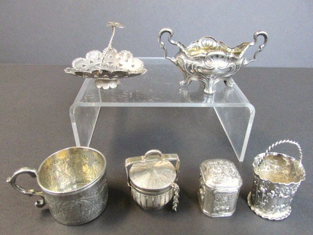 Dollhouse Group Silver Miniatures: Miniature center piece w/copper bottom 3 1/8 (w), Asian basket marked .90, child's cup 1.5 in. (h), w/European hallmarks, English repousse basket w/sterling mark, square snuff box w/European hallmarks