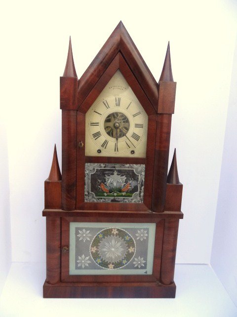 Fine Birge and Fuller Double Fusee Clock: Binge & Fuller, CT. double candlestick fusee shelf clock, figured mahogany case w/double candlesticks, painted metal dial, reverse painted glass, 8 day time & strike spring driven brass fusee movement