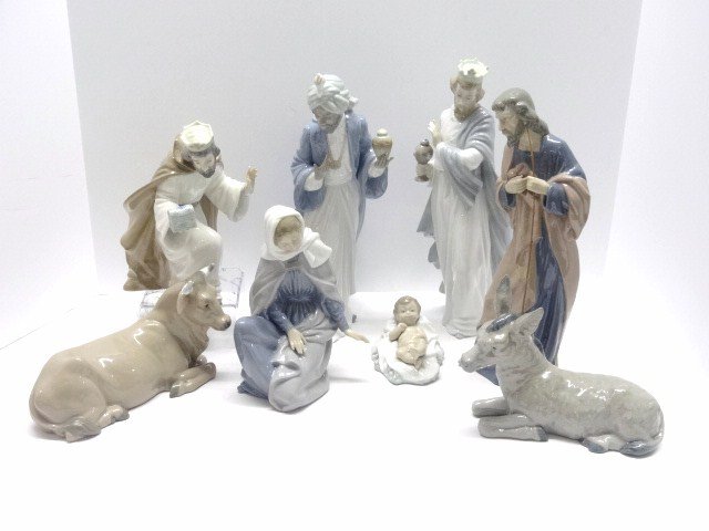 Eight Piece NAO by Lladro Nativity Set: NAO by Lladro nativity set in original boxes, set includes the three kings, donkey, cow, tallest being 11 in.