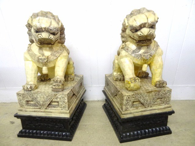 Large Bone Foo Dogs: Pair of large bone veneer oriental foo dogs sitting on rectangular bone veneer base sitting on wood bases, 31 in. (h) overall