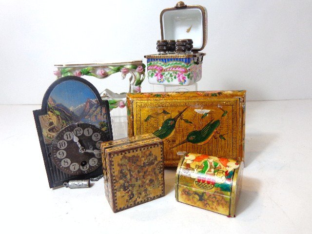 Dollhouse Miniature Limoges Perfume and Others: Wonderful Limoges ( black mark) perfume box and four glass bottles, rose decorated table, painted German style wall clock and three gold decorated boxes. 3" tallest