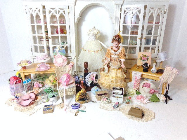 Dollhouse Ladies Dressing Shoppe: Large assortment of hats, linens, dress on form, dolls including one signed SH, white store back 11", purse,hats by Nancy Mander, jewelry, flowers, boxes and fans...just to name a few items much more 