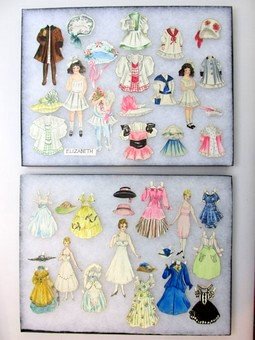 Handmade Watercolor set circa 1910: Housed in two display cases a very nice circa 1910 set with five dolls, tallest 6", along with 21 outfits and 12 hats