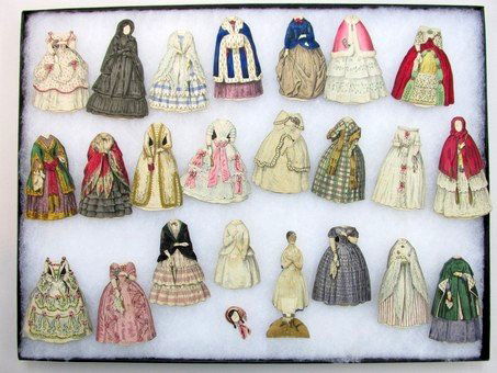 La Petite Coquette 1840's Set: Early 1840's set includes 3.5" H double sided cardboard doll and 22 double sided costumes with one bonnet, housed in display case