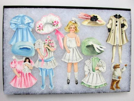 Handmade Paper Doll Set Watercolor & Ink: Nice handmade set circa 1910 with watercolor and ink decoration, 6" H doll has five costumes, four hats and a Teddy Bear housed in a display box